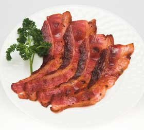 Sizzling bacon - The snap and sizzle of bacon crisping in a skillet will perk up any breakfast menu.