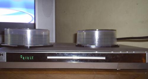Dvd player - This is my trusty dvd player. It gets a lot of use and plays nearly any media reliably. It isa godsend for people like us who livew in a cold and wet climate as much of the year it is movie watching weather!