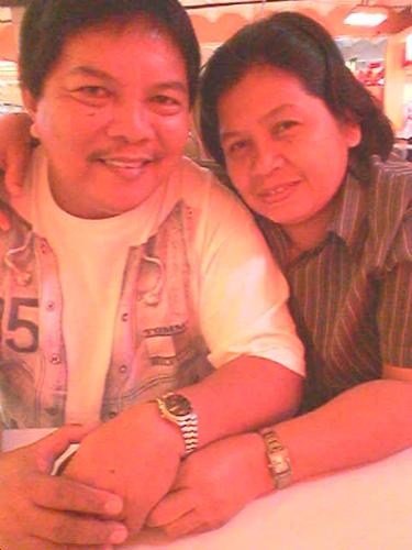 Dad and Mom... - My loving parents...this was taken inside the mall foodcourt. :-)
