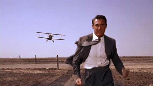 The famous crop dusting scene from North by Northw - North by Northwest is a popular Hitchcock film. Cary Grant plays a Manhattan advertising executive who's mistaken for a government agent. His attempts to clear up the misunderstanding only implicate him in a murder that makes him the target in a nationwide hunt. Forced on the run, he's faced at every turn by assassins out to kill him, and the mysterious Eva Marie Saint who's only too keen to help. Running at over two hours, Hitch is able to pack in many memorable sequences including the famous crop-dusting scene. While each of them excels in intrigue and suspense, he cleverly links them with black humour. Hitch delivers these emotional highs and lows with perfect timing, allowing moments of relief to break out before mounting another crescendo of excitement. The effect is like a grand musical work, conducted with bravura audience manipulation.