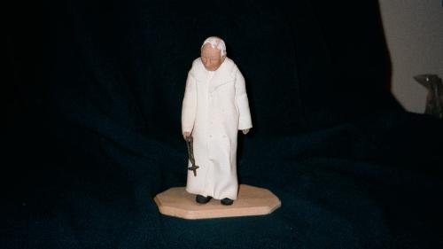Clay scuplture of Pope Paul - I love working with polymer clay and did this sculpture from a picture I saw of the Pope walking in his garden.
