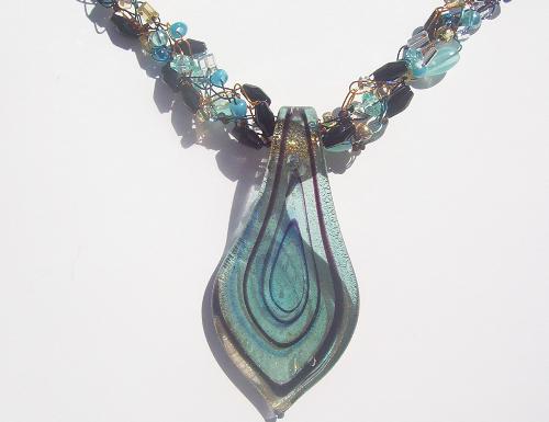 wire crochet  - A beautiful necklace crocheted with three different colors of wire and a coordinating glass pendant. Created by Alicia from Wyred On Wire to see more work check out www.freewebs.com/wyredonwire or http://wyredonwire.etsy.com