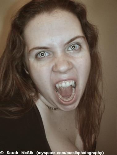 By: Sarah McSib - A vampire shot of myself, that I took through my PSP7 programm.