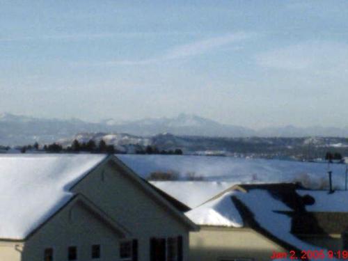 Housetops and Mountains - a view from my neghborhood of the neighboring mountains.