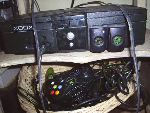 Xbox - The xbox is my gaming console of choice. I love it although I think it is time to break down and get the xbox 360. We've had this one for four years now.