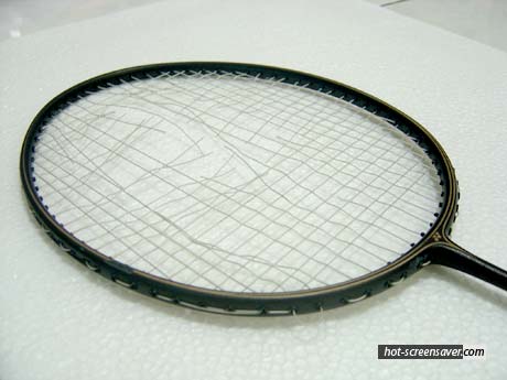 Broken string - broken string of a badminton racquet.