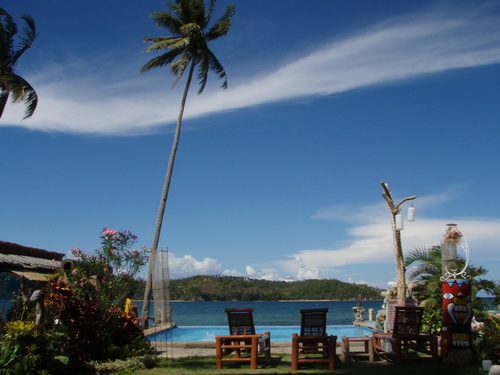Clear Skies. Pool. Beach - View of the pool deck at Puerto Nirvana, Puerto Galera, Mindoro, Philippines