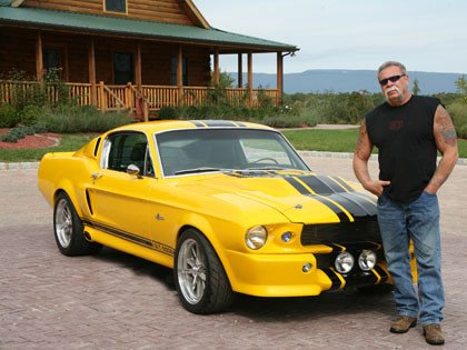 paul teutul - paul teutul senior next to a yellow mustang