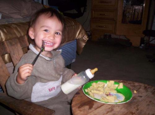 My son with his table and chair. - Dorian loves to eat at his mini table!