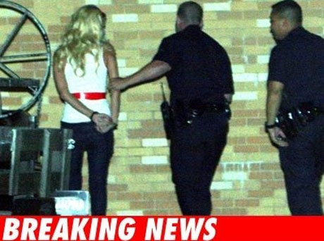 Paris Hilton goes to jail - Paris being arrested.