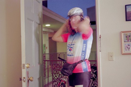 Getting ready for a ride. - This is a picture of me getting ready for a bike ride.  Sorry for the blurryness as I needed a slow shutter speed due to lack of light and time to set up other lights.