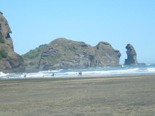 Piha Beach - This is a beautiful beach in New Zealand, Piha. The Rock is natural and wonderful.