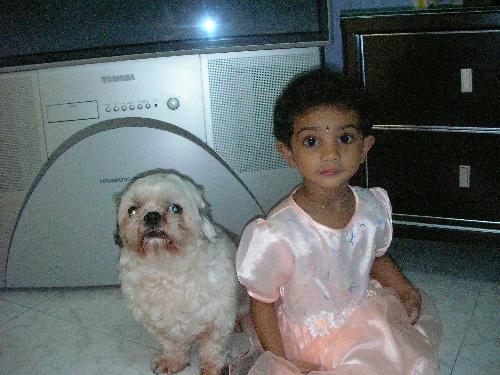 my gal n my pet dog - pic was taken at home my gal was 2yrs old. My pet dog's name is fluffy...