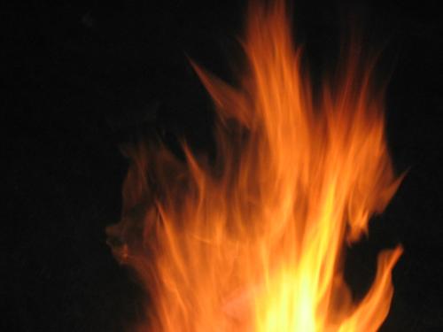 More Flames - I love watching the flames jump and dance  in and around the wood in the pit.