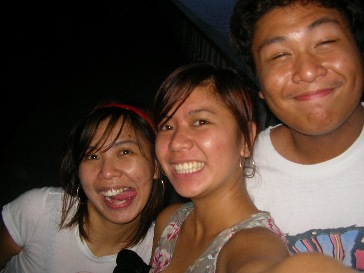crazy cousins - That's me, my sister, and our cousin Kolo at a resort here in the Philippines. We were just goofing around:D