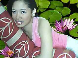 jpeg - A girl in a water lily backgroud.Isn't it cute?hehehe just trying to have fun(^_^)
