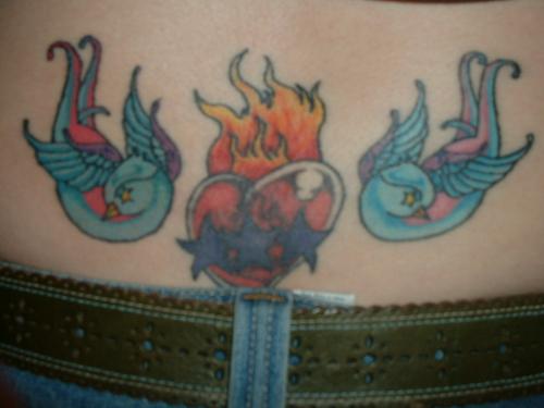 Tattoo - This is my lower back piece of the immaculate heart and swallows
