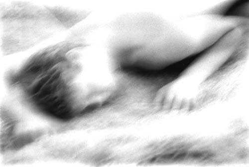 Dreaming - A guy sleeping. This picture was done in a dream like, fuzzy sense.