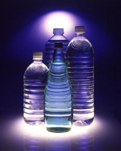 Assorted Bottles of Water - This photo depicts some of the variety of bottled water available now...Water is a major contribution in the prevention of dehydration......