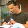 Jason and Jake - Jason holding and feeding his newborn son Jake