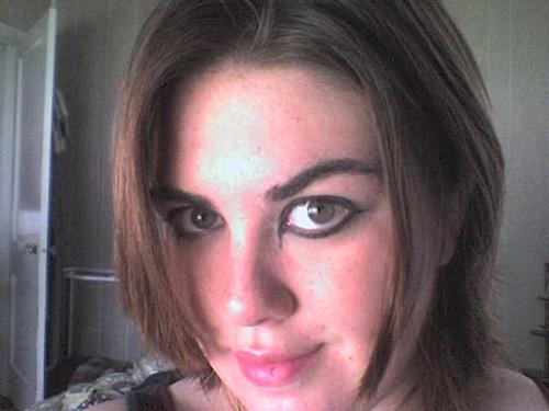 Just me posing for the camera! - This is me just taking funny pictures of myself with a cell phone.