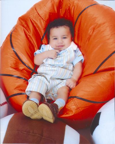 his first photo shoot tooken March 30, 2007 - him in his basketball bean bag chair.