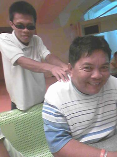 The Blind Man Massaging Dad... - man