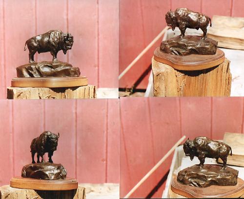 Buffalos - Small bronze buffalos.