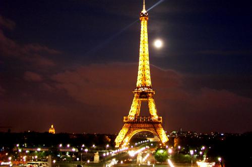 paris - effil tower - an iron structure tht marks the true romantc essence of paris! located on the banks of seine , its an tourist attraction tht attracts more thn 5 million tourists every year!