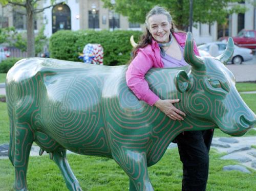 'Cow Paths' and Me - This is the fiberglass cow I painted for the Jimmy Fund's 'CowParade, Boston.' I was one of about 100 artists chosen to paint a full size cow, and I called mine 'Cow Paths.' It had one path which ran all over the cow, going into and out of 7 different labyrinths. This photo was taken at the unveiling in Boston (5/06). All of the over 100 cows were exhibited on the streets of Boston for the summer, and then auctioned off with the proceeds going to the Jimmy Fund and the Dana Carver Cancer Institute.