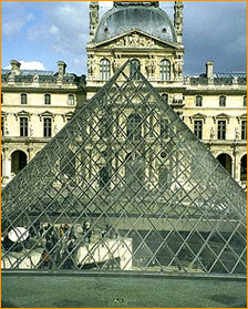 paris - this is the picture of the most famous musuem in paris called as the louvre musuem. this structure is known for its architecture and is famous tourist location.