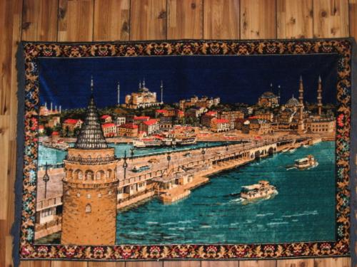 Egyptian Tapestry - This is from Egypt. It depicts life on the Nile. It's from my wifes restaraunt. The owner is from ElMansura Egypt.
