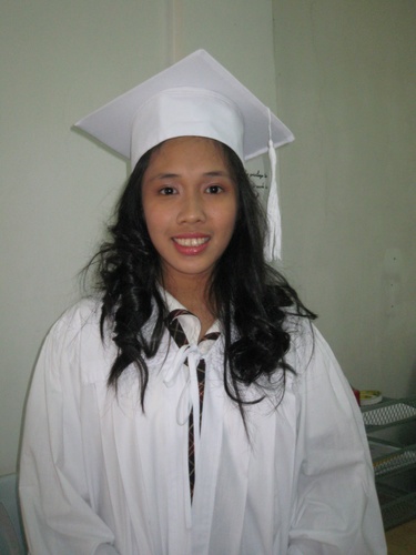 graduation  - this is my sister joanna in her graduation gown, she graduated last april from high school.