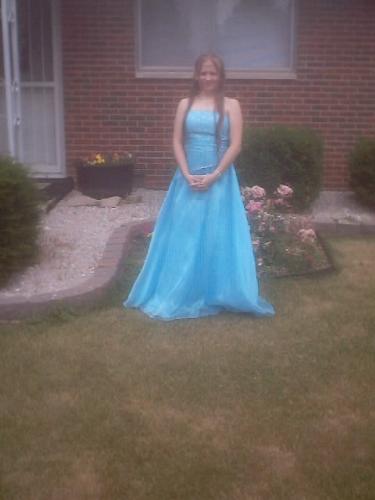 My daughter - My daughter showing how long her hair is. It is even longer now.