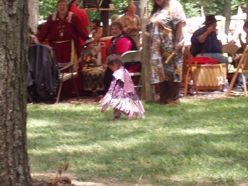 Tiny tot in regalia - Even the youngest children have a part in the powwows.