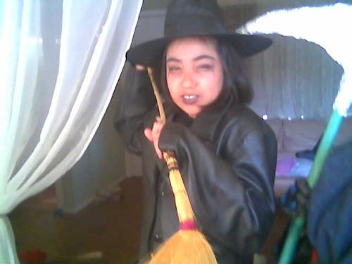 Dont Mess with me or il turn you into a toad - Another one that was taken on halloween, my daughter posing with her broom thing