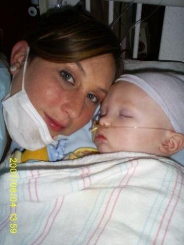 Kristy & Kaleb - A picture of Kaleb in the hospital, fighting for his life, and his mommy Kristy right by his side!