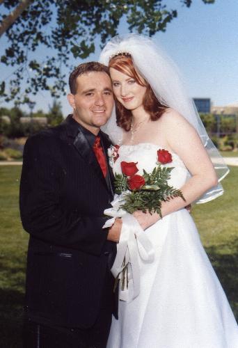 The happy newlyweds!  - My husband and I just after saying I do!