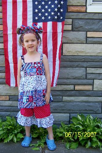 5yr. old daughter in a Patriotic outfit I just com - An outfit I just finished, complete w/hair accessories. It's a 5T, possibly even to fit an average 6 yr. old. Great outfit and bows. The bows are even great for school uniforms if they're the right colors. Check it out on eBay (6/15 - 16/20/07). Search: Boutique FAD.