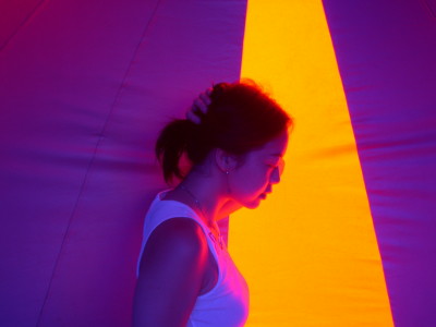 DreamyColor - The picture was taken in an art fest. Colorful lights and background were changing randomly by some tech. This is not my normal style. Posing abnormally in front of a camera is my interest.