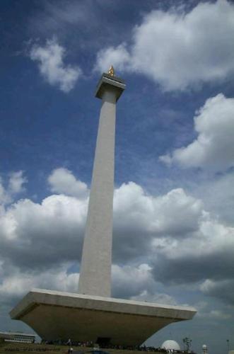 Monas in Jakarta,Indonesia - The Monumen Nasional (or Tugu Monas, the National Monument tower) is a 450 ft (137 m) tall tower in Central Jakarta, symbolizing the fight for Indonesia's Independence. Its construction began in 1961 under Sukarno and was not finished until 1975 under Suharto. It is topped by a 14.5 tonnes flame-shaped bronze plated in 35 kg (1,125 troy ounces) of gold.  Visitors can take a lift up to a platform with a good view of Medan Merdeka Park, Istiqlal Mosque and the city, if it is not too foggy. Inside the base of the monument is an exhibition on the country's Declaration of Independence and several dioramas showing the history of Indonesia.