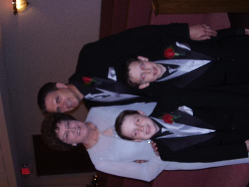 me, my son and grandsons - This picture was taken shortly before the wedding ceremony. Don't the boys look cute in their suits? Boy, they couldn't wait to get them off afterwards.