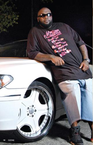 Rick Ross - BMW pic - Rick Ross leanin' against the bm-dub'