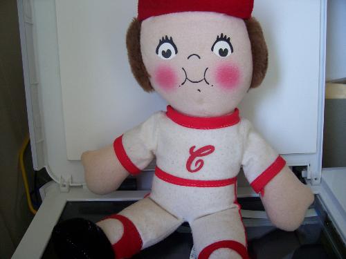 Red and white Dolly - found at a church rummage sale, appears to be baseball related. brown short hair and red cap. 