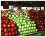 Apples - A photo of apples on display at a grocery store.