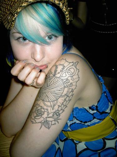 Knitzy - Knitzy is a model for Suicide Girls... She is really into knitting if you cannot tell here by her tattoo