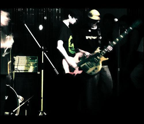 soundcheck 1... 2... 3... - this photo is the second gig of SoundCheck 130 band Equator Pooc Talisay, Cebu City, Philippines... from left to right: its me (guitarist) and mark chi (bassist). I edited it with Photoshop Cs3 and i only use the Curve effects... thats it..