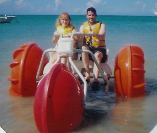 Mike and Me on a Water Trike in Ochio Rios, Jamaic - This was so fun. Mike and I rode this in Fall of '04. It was tougher than it looks, but a lot of fun. We look like little kids in that picture.