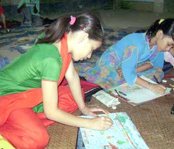 children - Young girls taking part in a painting competition in Asom, India.