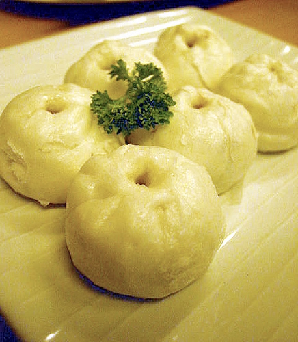 Siopao ( Steamed Buns ) - The pic doesnt really show the super white siopao that I want but it looks delicious though :)